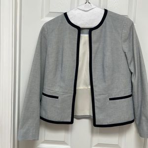 Blazer from Talbots. Size 6. Trim is navy blue. Silk lining